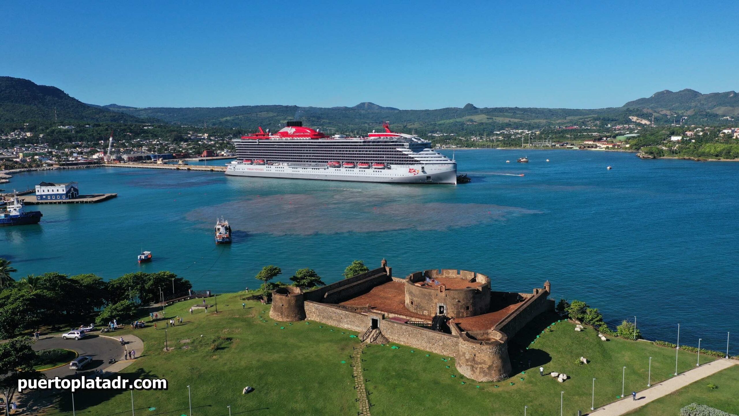 View of Scarlet Lady docked in Taino Bay, and the Fort san Felipe in the foreground