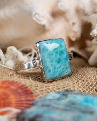 Golden ring with large Larimar stone