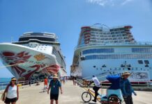 Amber Cove Pier Two docked cruise ships at the Amber Cove Pier.