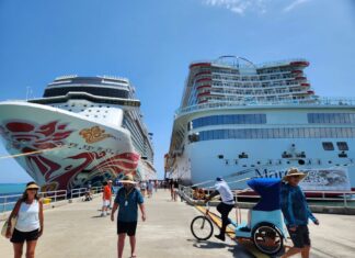 Amber Cove Pier Two docked cruise ships at the Amber Cove Pier.